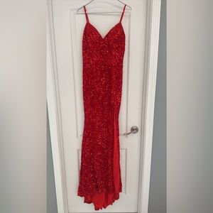 Red sequin prom dress. never worn, brand new. open back w slit on the left side